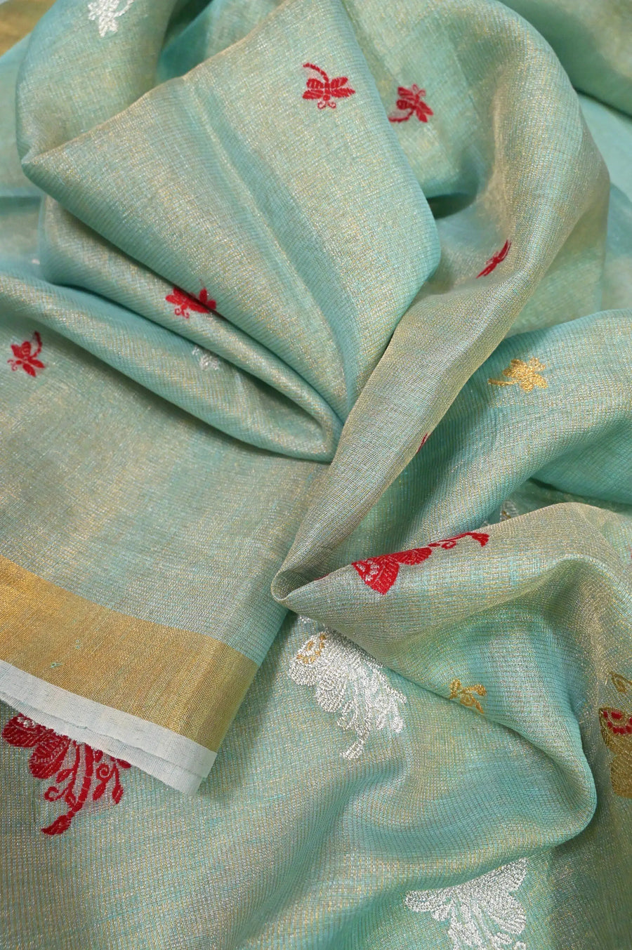 Firozi Color Tissue Linen Saree with Allover Silver and Golden Zari Butta Work