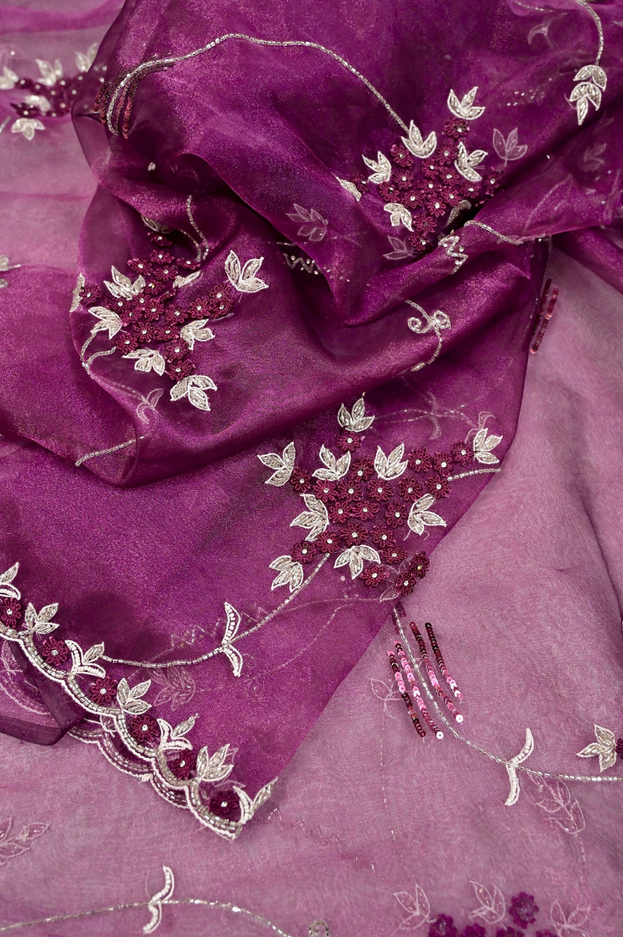 Purple color Glass Tissue Silk Saree with Hand Embroidery and Stone Work