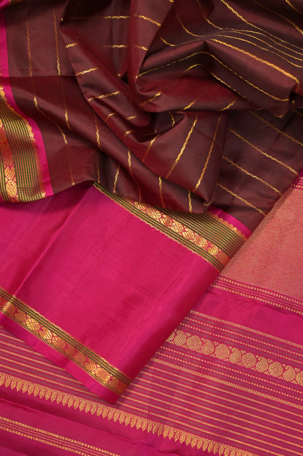 Pure Kanjeevaram Silk Saree in Chocolate and Magenta Color with Allover Golden Zari Stripe with Gap Border
