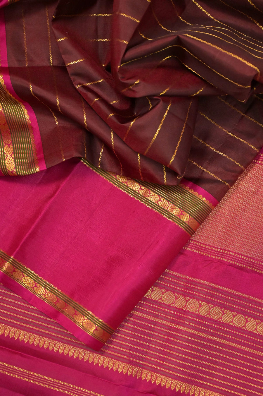 Pure Kanjeevaram Silk Saree in Chocolate and Magenta Color with Allover Golden Zari Stripe with Gap Border