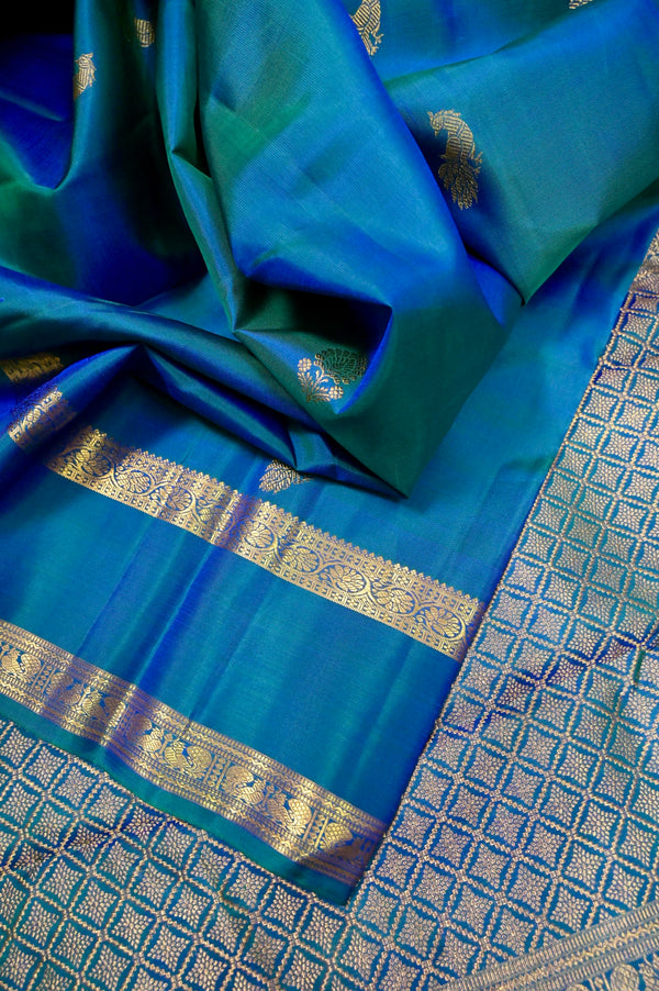 Pure Kanjeevaram Silk Saree in Blue and Green Color Dual Tone with Allover Zari Butta with Gap Border