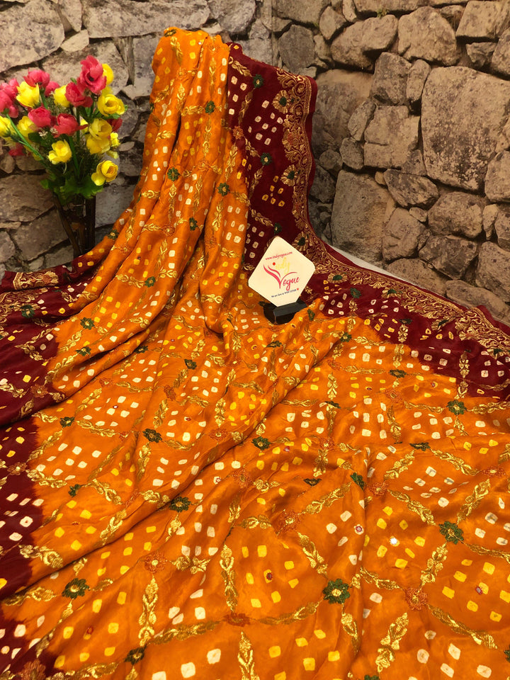 Apricot and Maroon Color Ghazi Gharchola Silk Saree with Mirror & Hand Bandhani Work