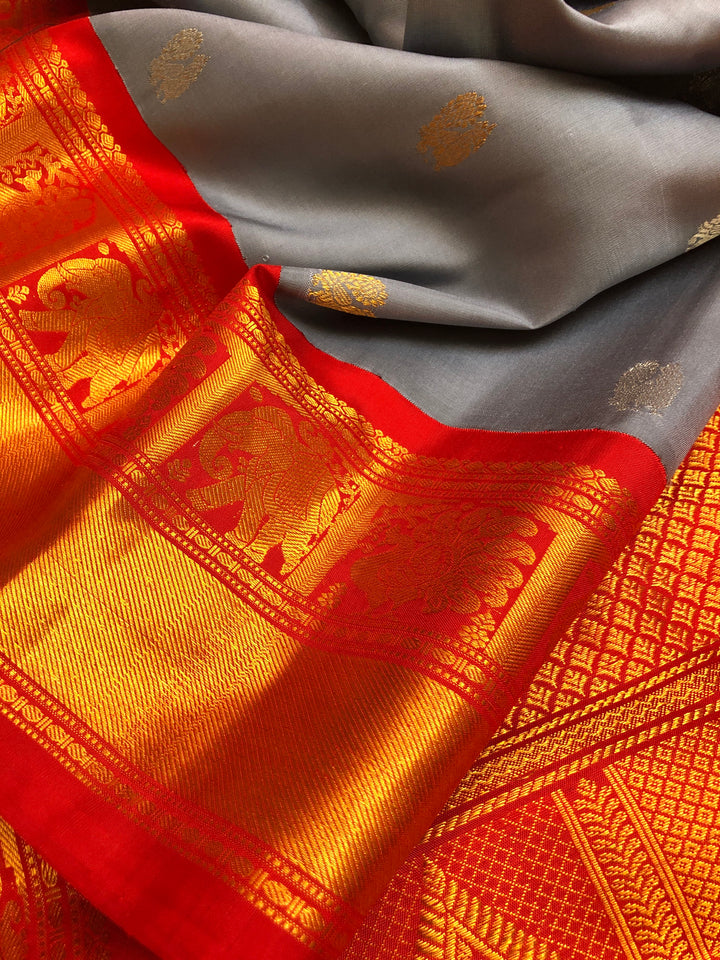 Ash Color Pure gadwal Silk Saree with Silver & Golden Zari Motif Work