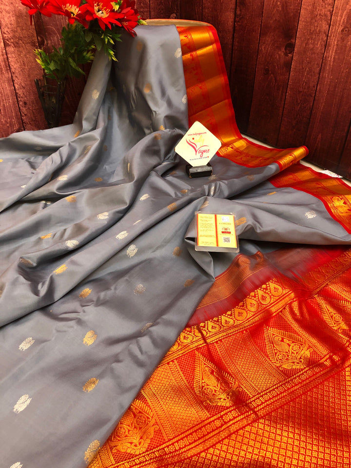 Ash Color Pure gadwal Silk Saree with Silver & Golden Zari Motif Work