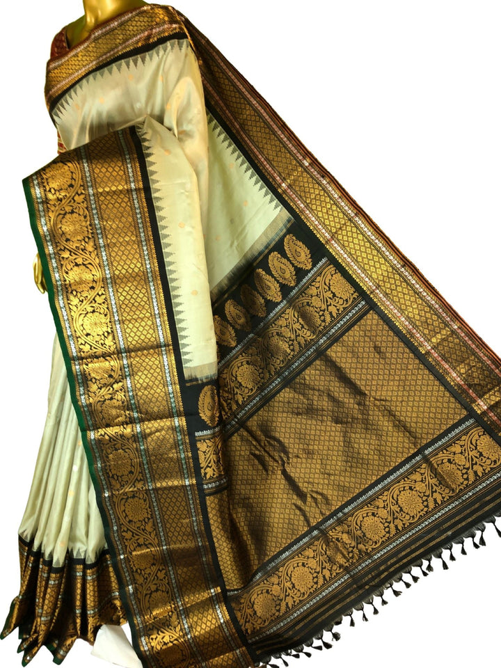 Cream and Black Color Gadwal Silk Saree with Antique and Silver Zari Work