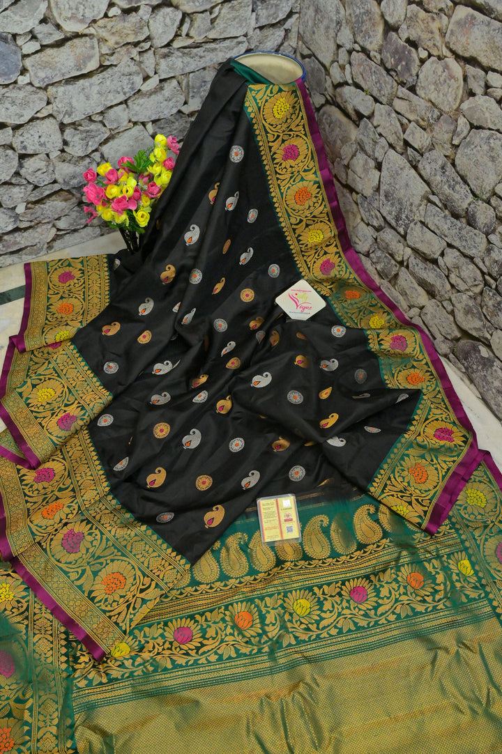 Dark Black Color Pure Gadwal Silk with Meenakari Buti and Golden & Silver Zari Work
