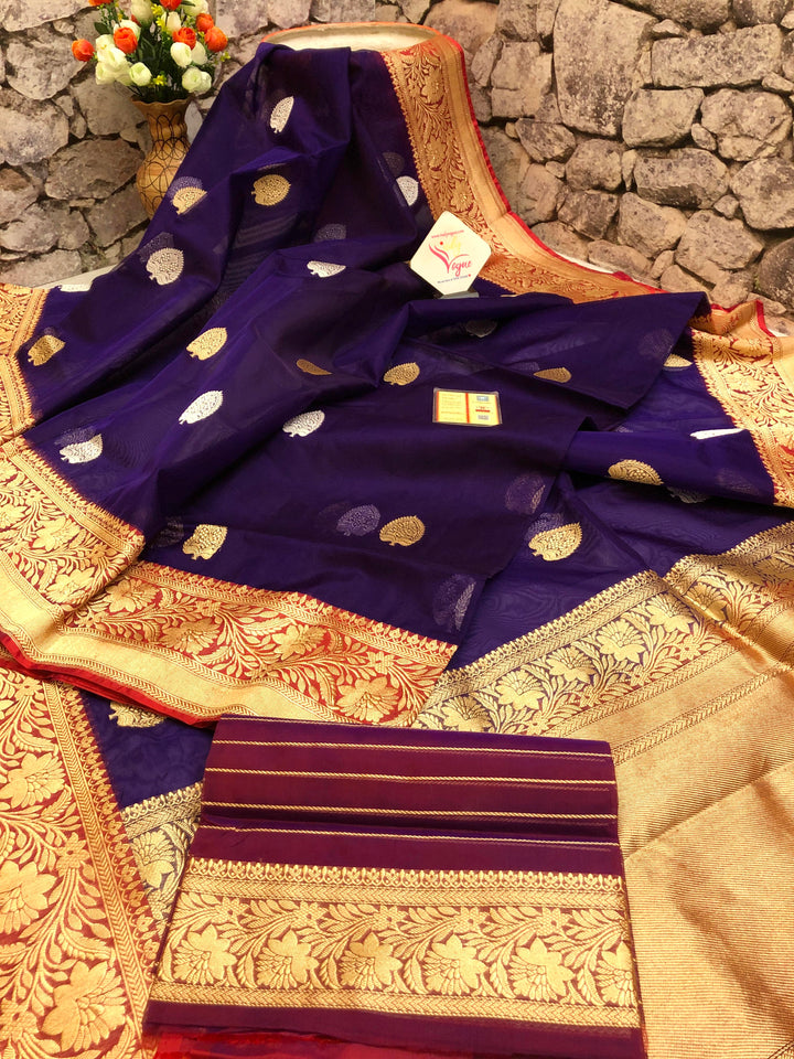 Dark Brinjal Color Pure Kora Organza Banarasi Silk Saree with Silver and Golden Zari Butta Work