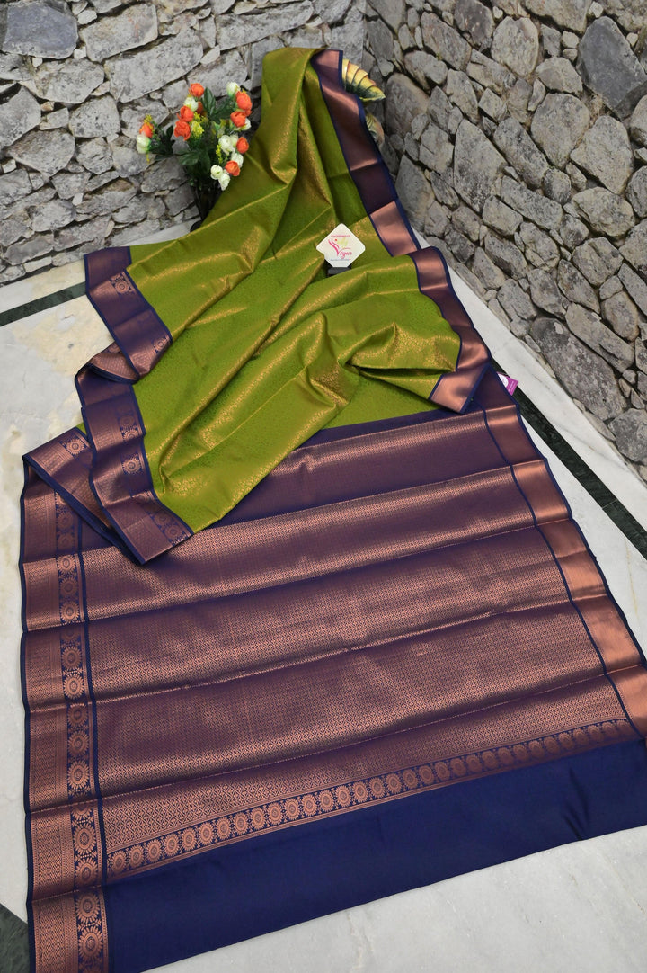 Dirty Parrot Green Color Brocade South Silk Saree with Copper Zari Work