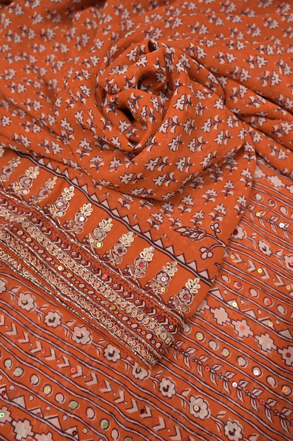 Georgette Saree in Rust Color with Floral Print and Zari and Sequin Embroidery on Pallu with Cod Piping Border