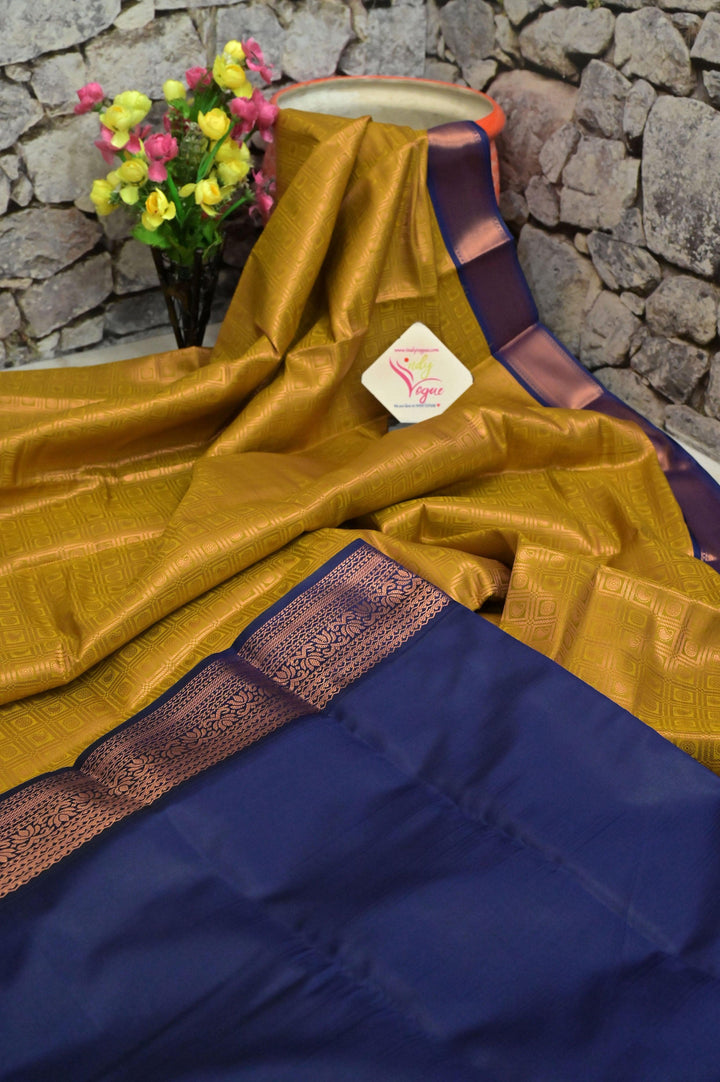 Golden Pista and Blue South Silk with Brocade and Copper Zari Check Pattern Work
