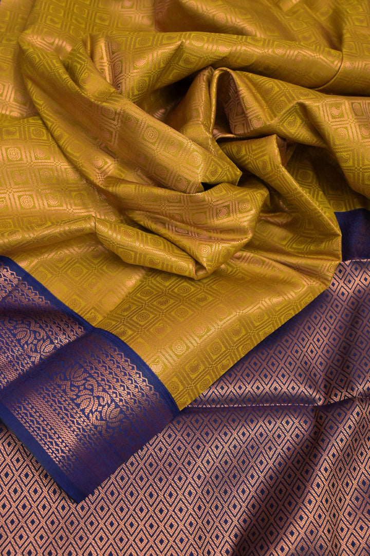Golden Pista and Blue South Silk with Brocade and Copper Zari Check Pattern Work