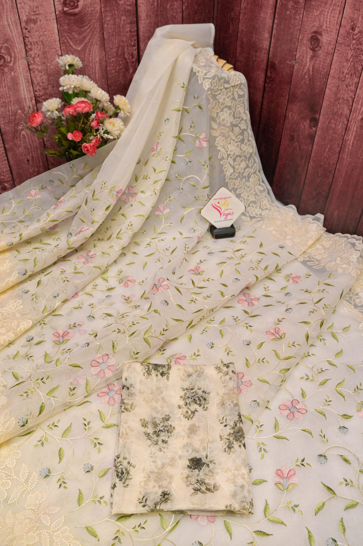 Light Cream Color Organza Saree with Machine Embroidery