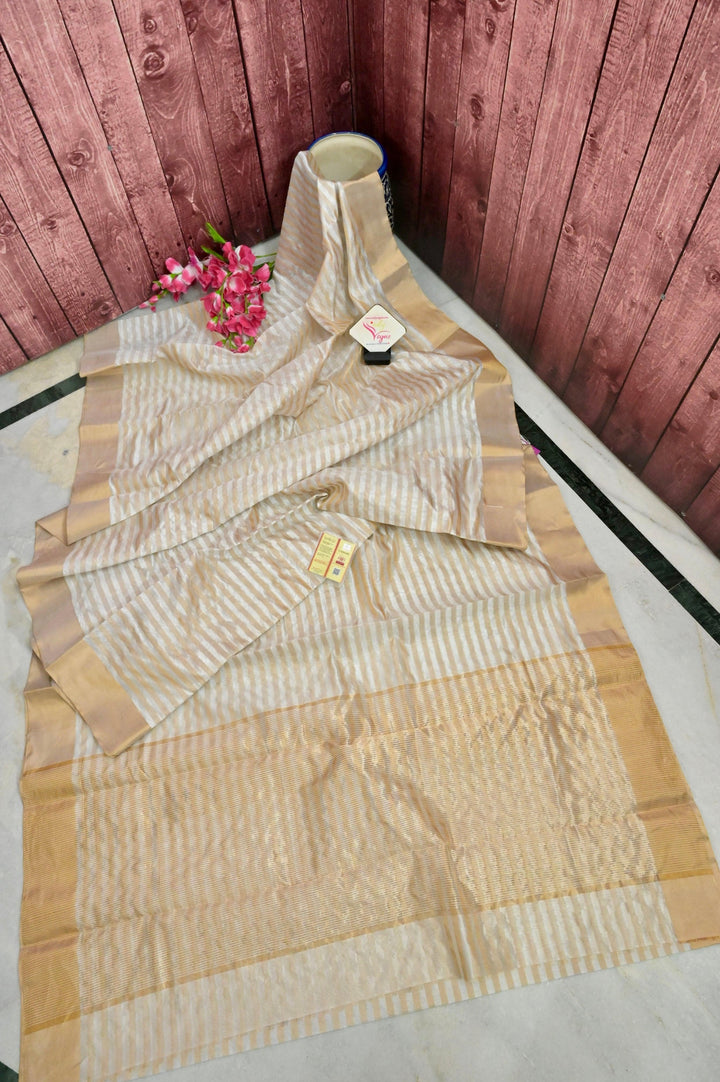 Offwhite Color Chanderi Banarasi Saree with Golden Stripe Zari Work