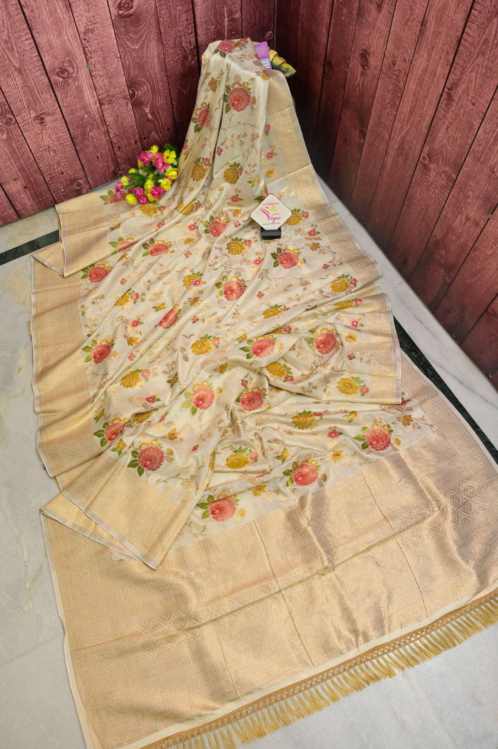 Offwhite Color Muga Banarasi Saree with Allover Golden Zari Work