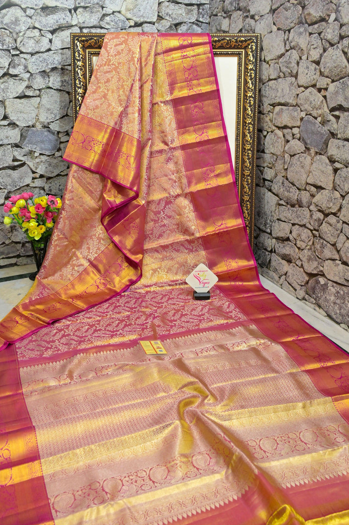 Peach and Magenta Color Brocade Kanjeevaram Silk Saree with broad Border