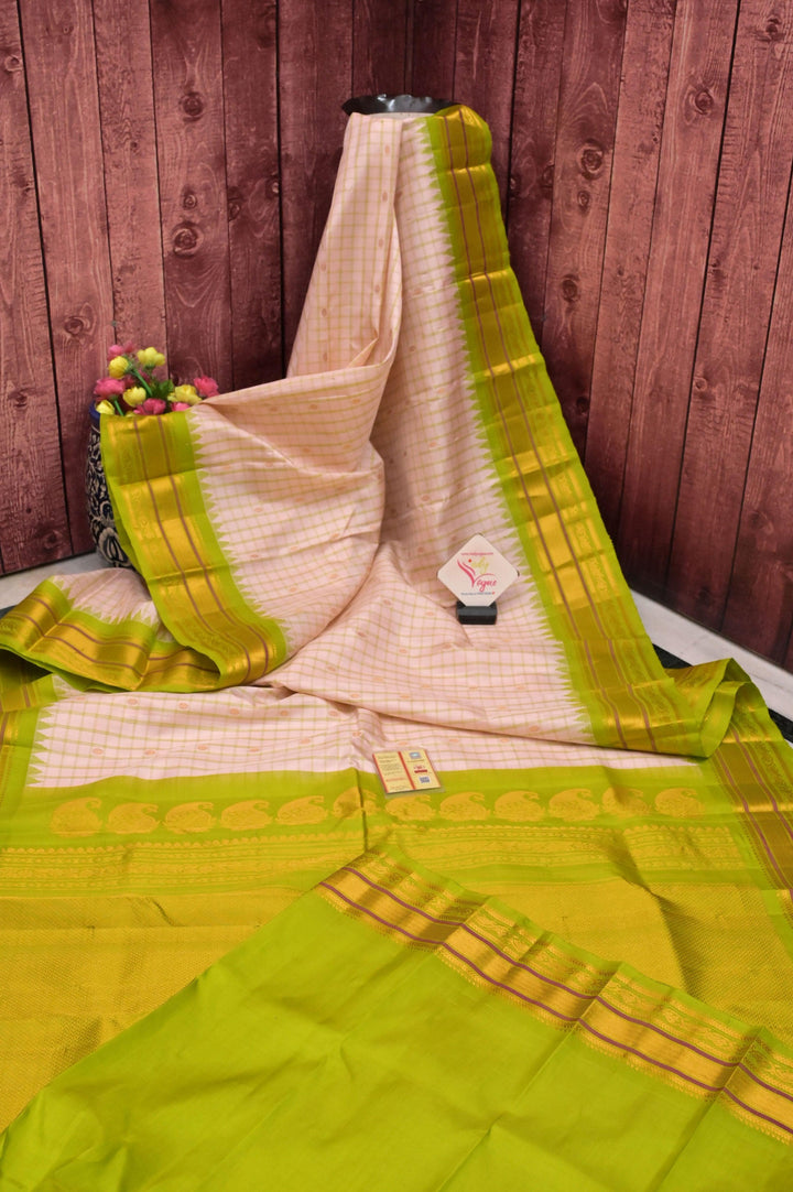 Peach Offwhite Color Pure Gadwal Silk Saree with Checks and Temple Border