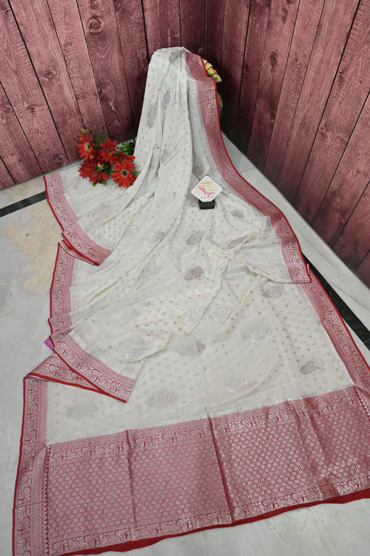 Powder White and Red Color Georgette Banarasi Saree with Silver Zari Work