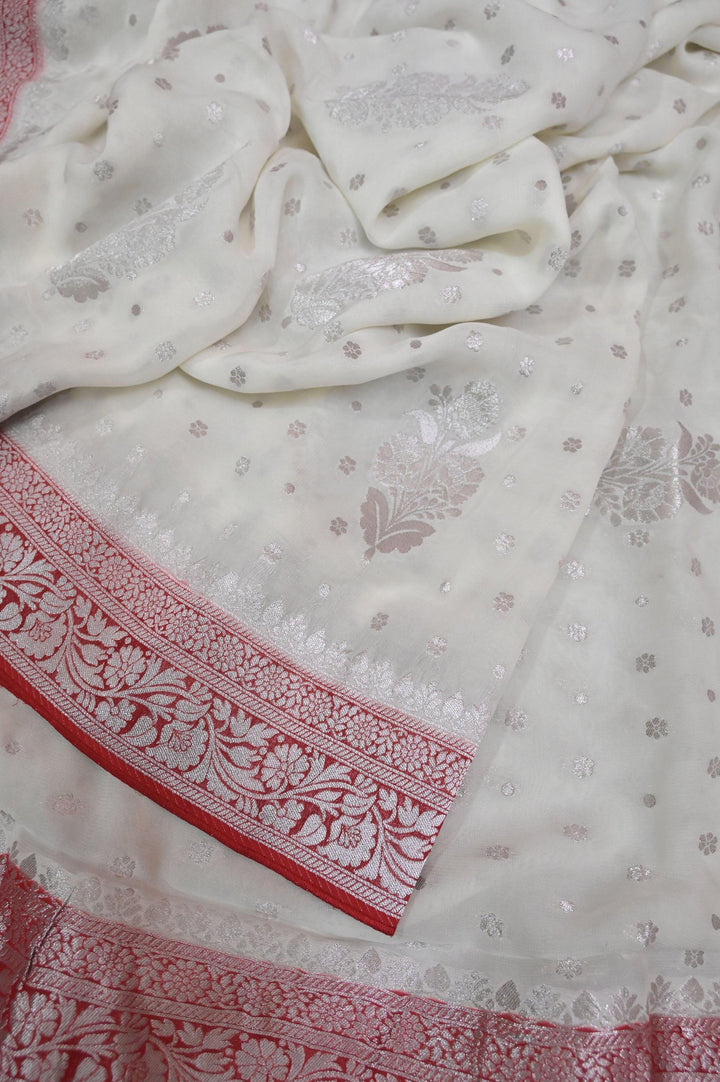 Powder White and Red Color Georgette Banarasi Saree with Silver Zari Work
