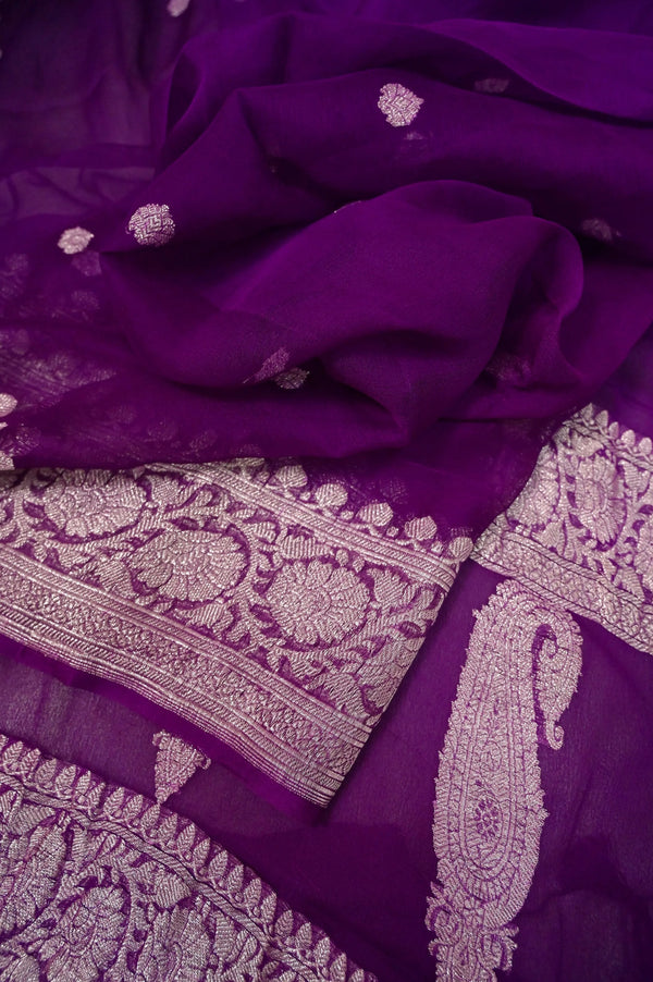 Pure Chiffon Saree in Dark Purple Color with Allover Silver Zari Butta Work with Zari Border and Pallu