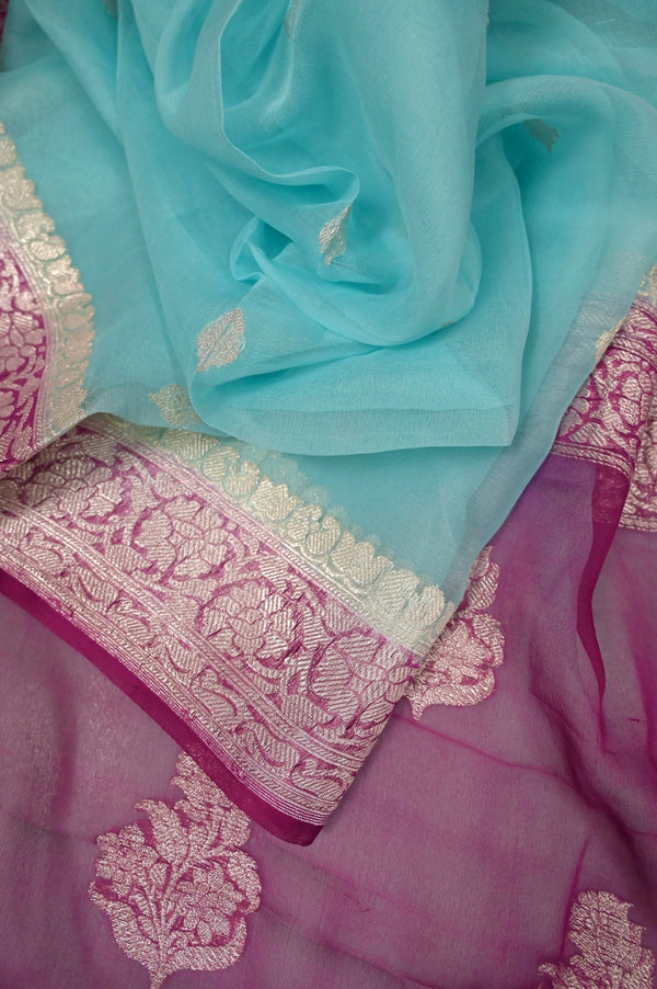 Pure Chiffon Saree in Light Blue and Purplish Magenta Color with Allover Silver Zari Butta Work with Zari Border and Pallu