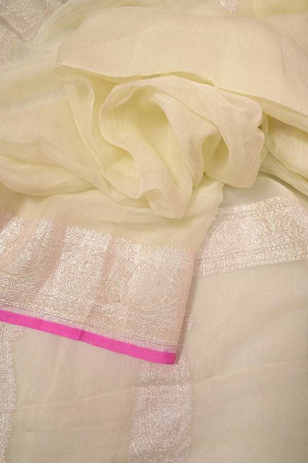 Pure Chiffon Saree in Light Cream Color with Allover Silver Zari Butta Work with Zari Border and Pallu