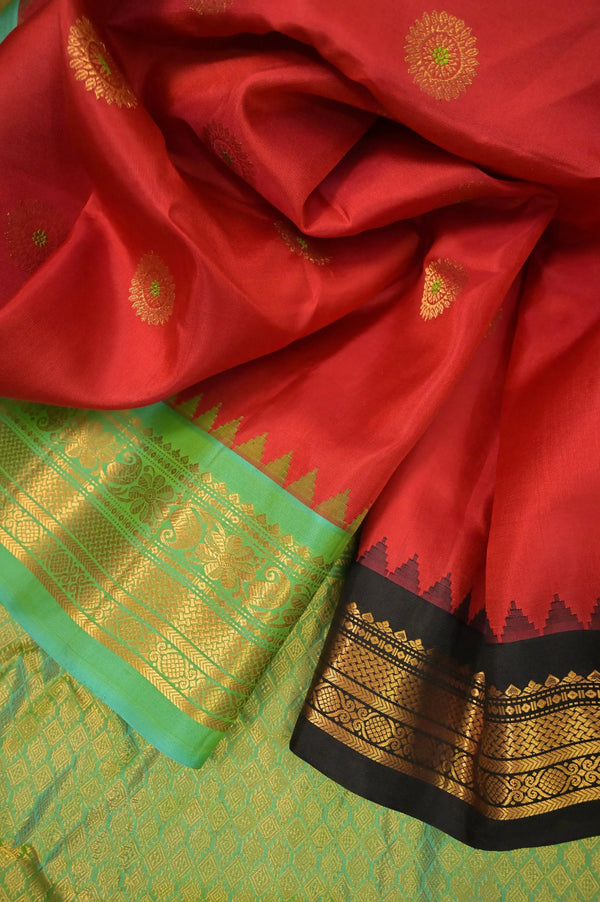 Pure Gadwal Silk Saree in Scarlet Red Color with Allover Meenakari Buti with Ganga Jamuna Zari Border