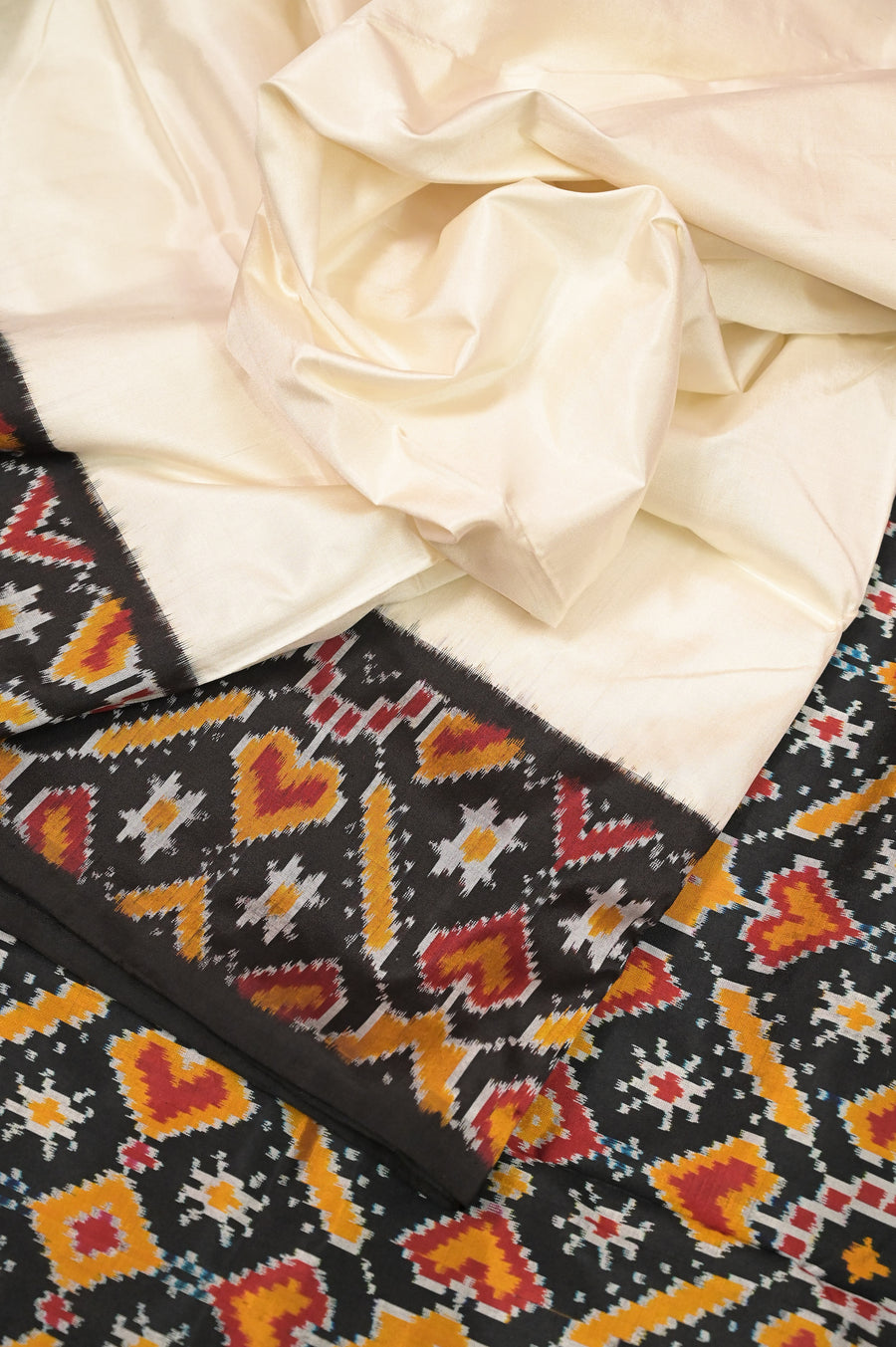 Pure Ikat Silk Saree in Offwhite Color Plain Body with Multicolored Ikat Design Border and Pallu