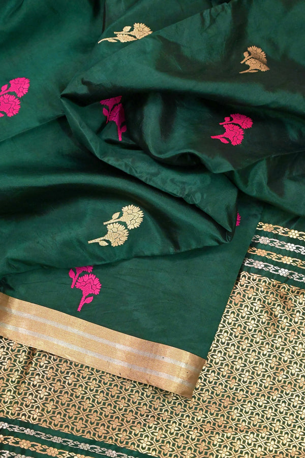 Pure Katan Banarasi Silk Saree in Bottle Green Color with Golden Zari Butta with Silver and Golden Zari Work Border and Pallu
