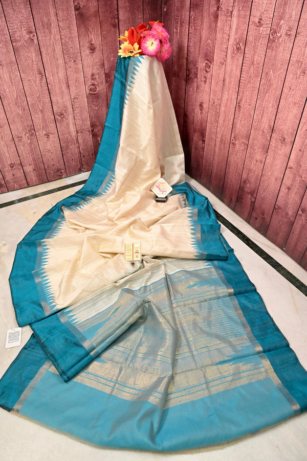 Pure Raw Silk Saree in Offwhite and Cyan Blue Color with Contrast Color Temple Border and Zari Check Pallu