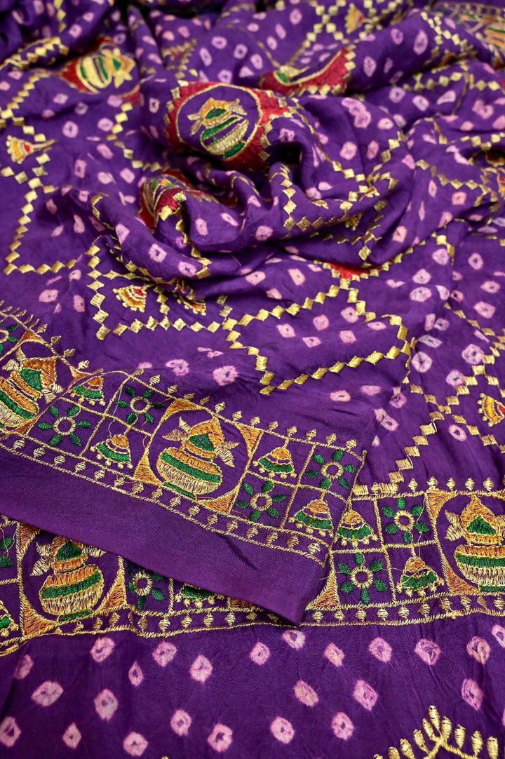 Purple Color Ghazi Silk Gharchola Saree with Hand Bandhani Work