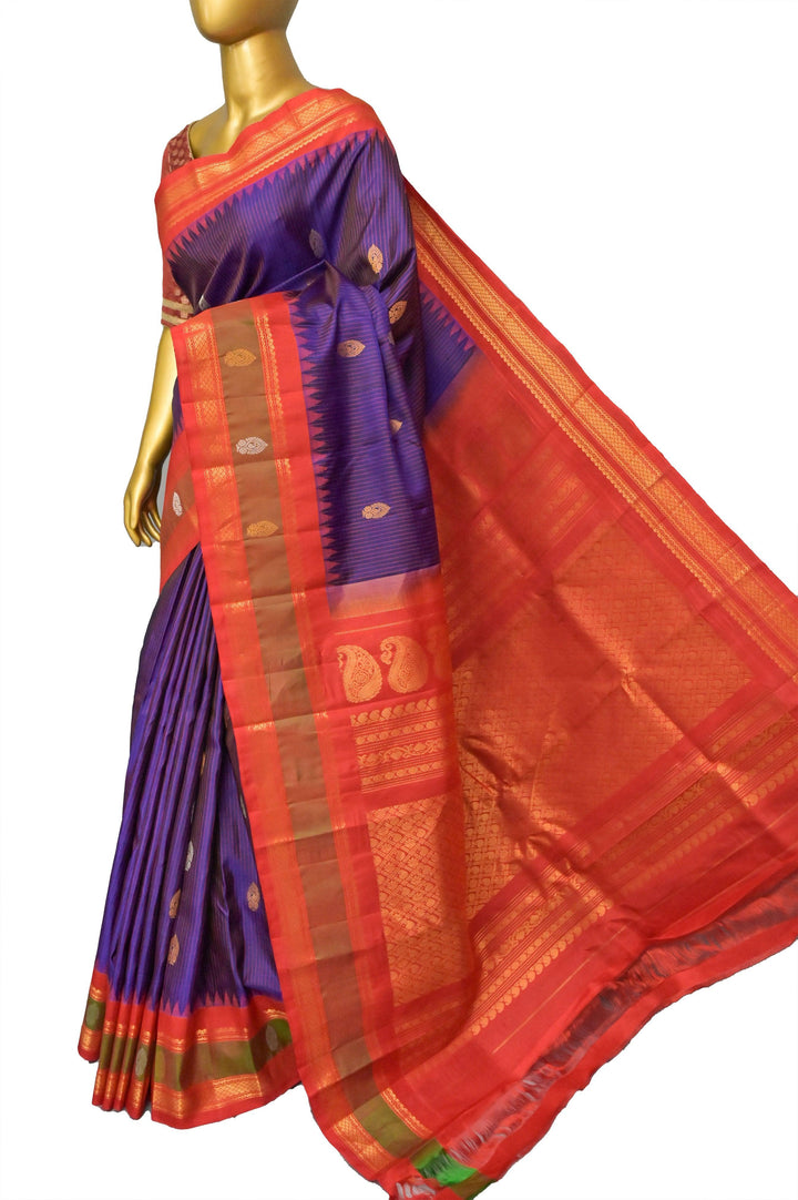 Purplish Blue Color Pure Gadwal Silk Saree with Small Graph Checks and Paisley Buti