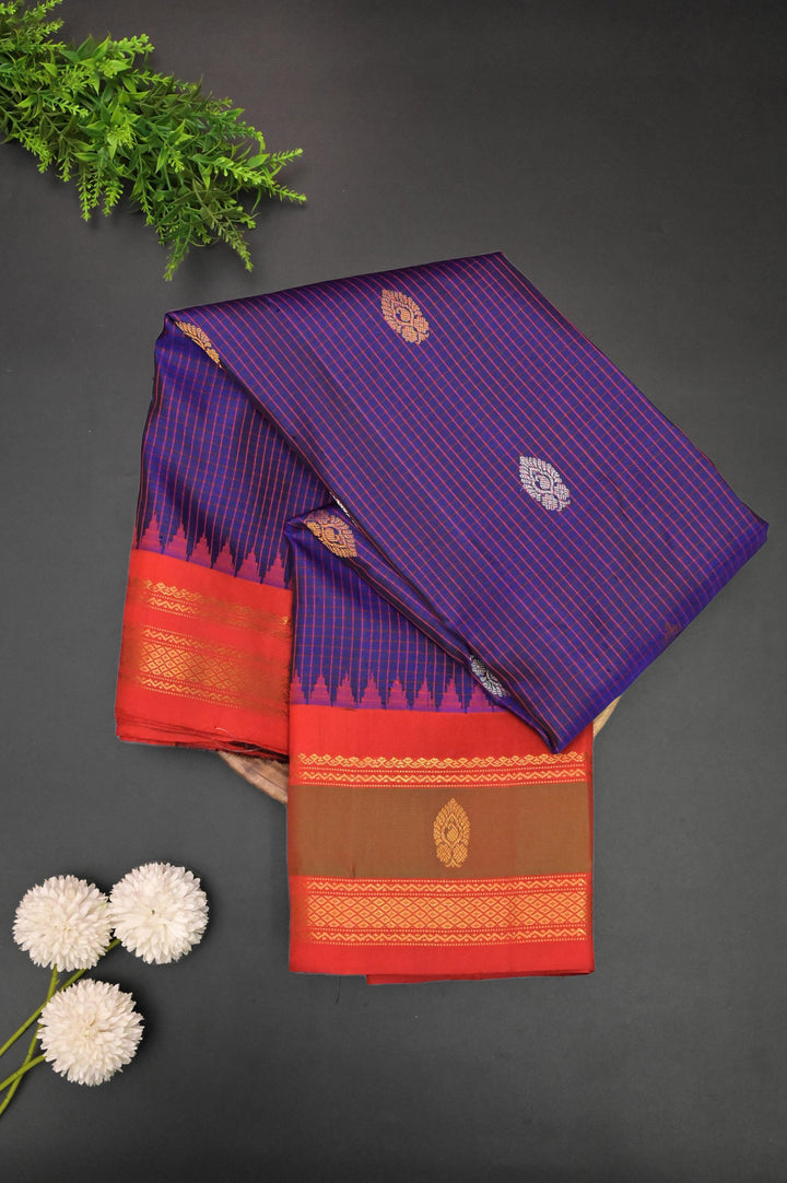 Purplish Blue Color Pure Gadwal Silk Saree with Small Graph Checks and Paisley Buti