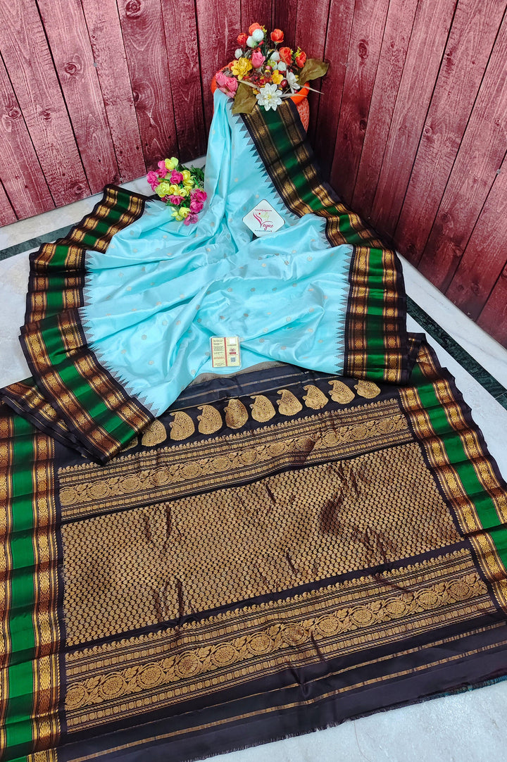 Sky Blue Color Pure Gadwal Silk Saree with Buti Work and Temple Border