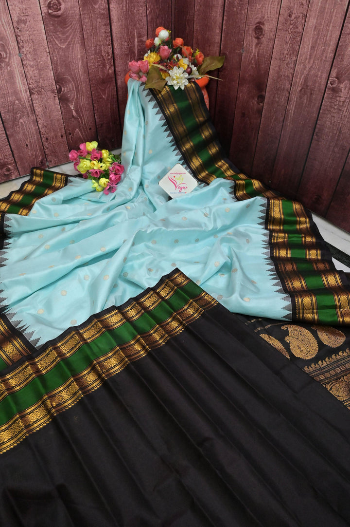 Sky Blue Color Pure Gadwal Silk Saree with Buti Work and Temple Border