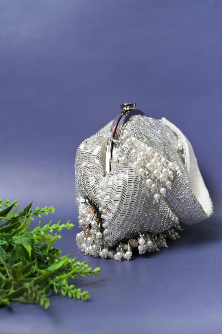 White Designer Handbag Woven with Styling Pipes and Pearls