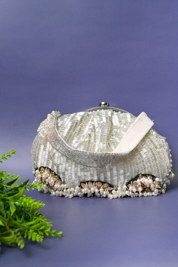 White Designer Handbag Woven with Styling Pipes and Pearls