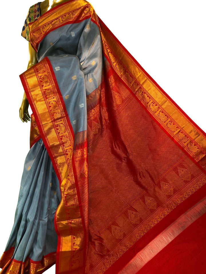 Ash Color Pure gadwal Silk Saree with Silver & Golden Zari Motif Work
