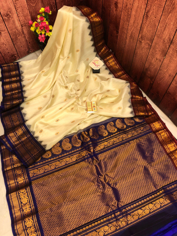 Cream Color Pure Gadwal Silk with Ganga Jamuna Border