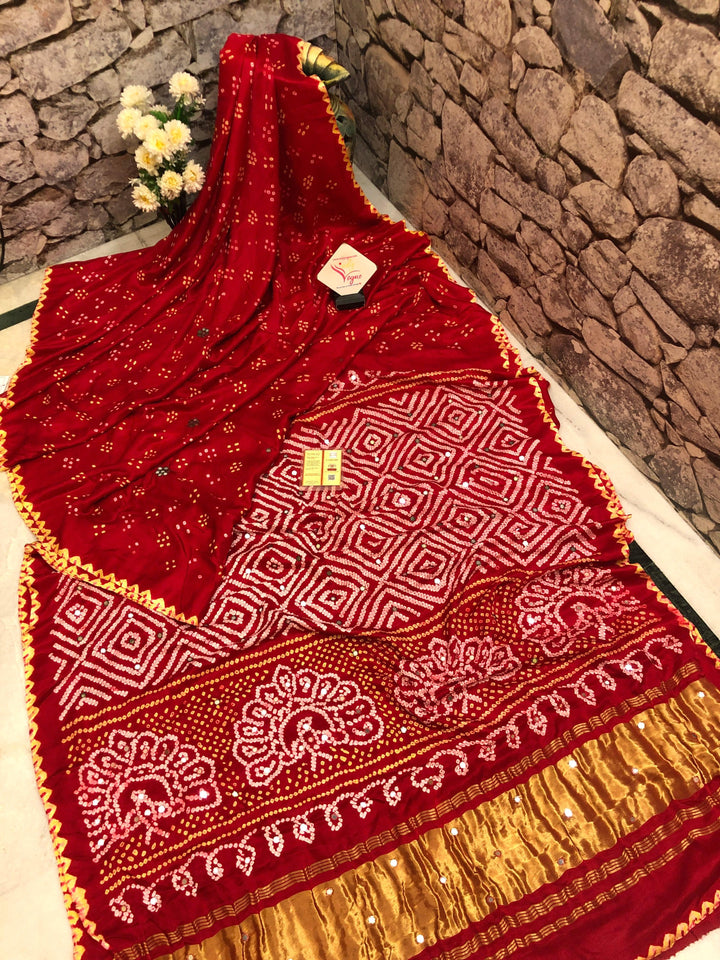 Crimson Color Pure Ghazi Silk Gharchola Saree with Mirror & Bandhej Work