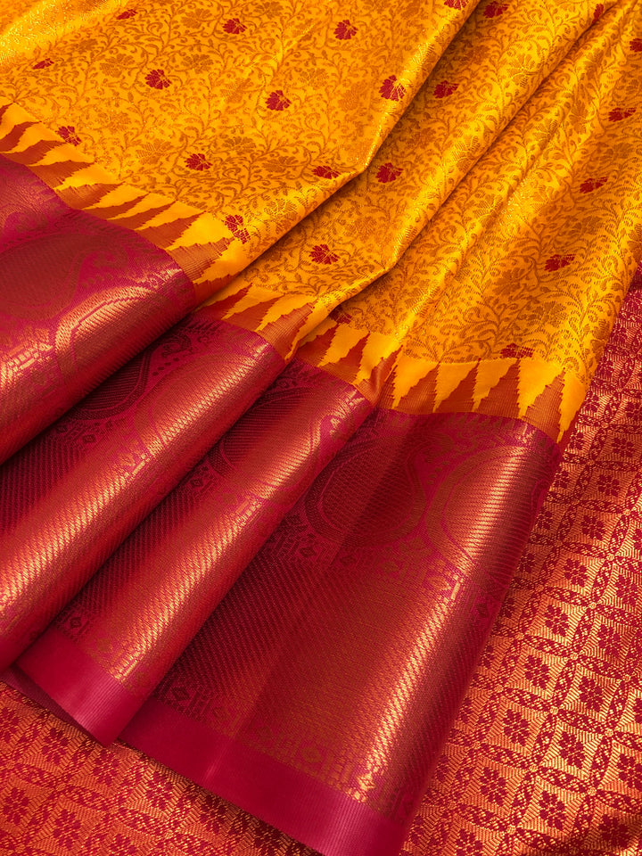 Fiery Golden Yellow Color Kanjeevaram Saree with Brocade Work