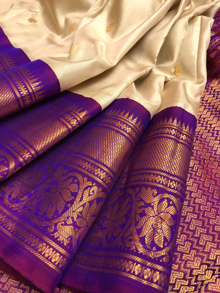 Off white and Purple Color Pure Gadwal Silk Saree