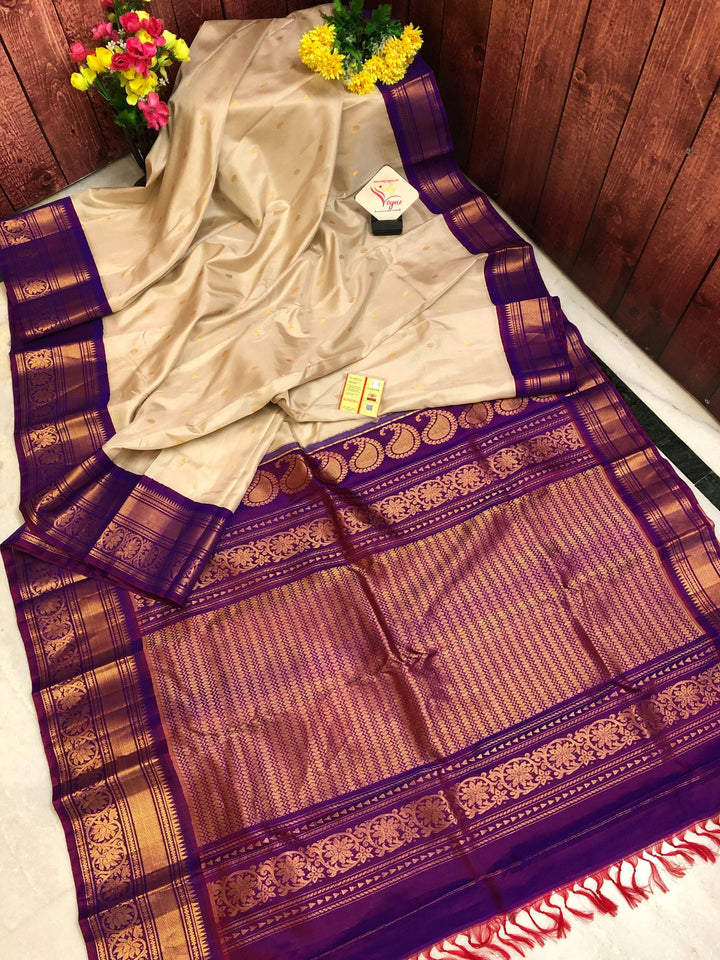 Off white and Purple Color Pure Gadwal Silk Saree