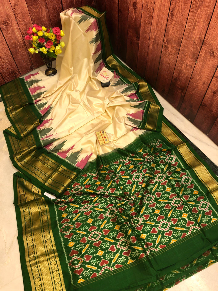 Offwhite and Pine Green Color Ikat Silk Saree with Kanchi & Temple Border